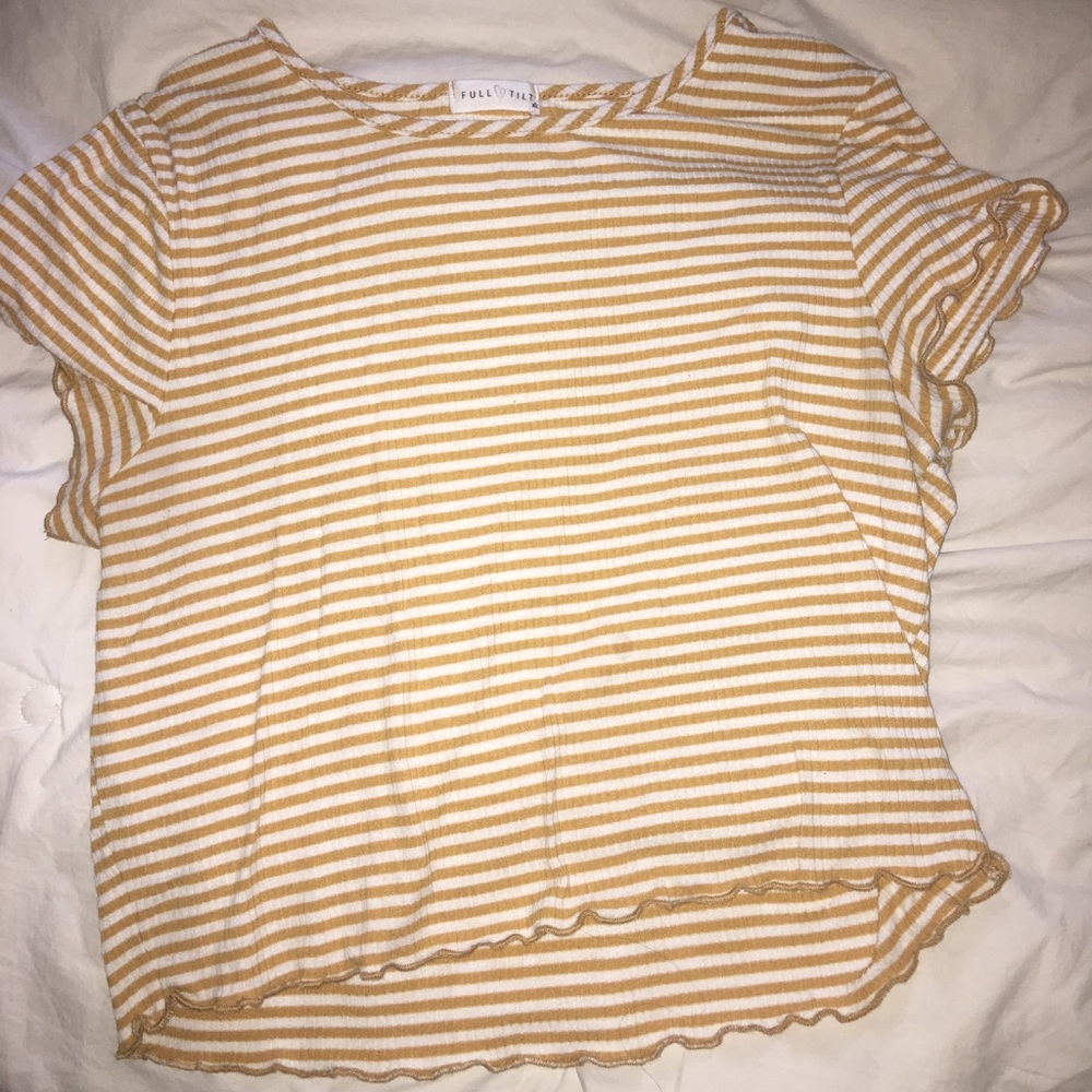 A crop top with mustard yellow and white stripes